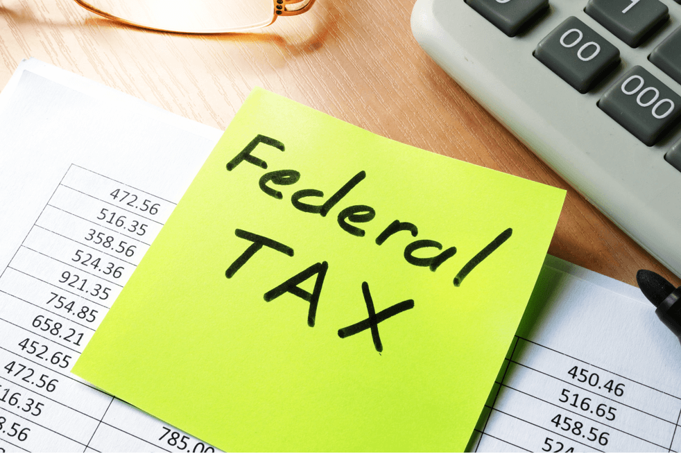 sticky note with federal-tax-on