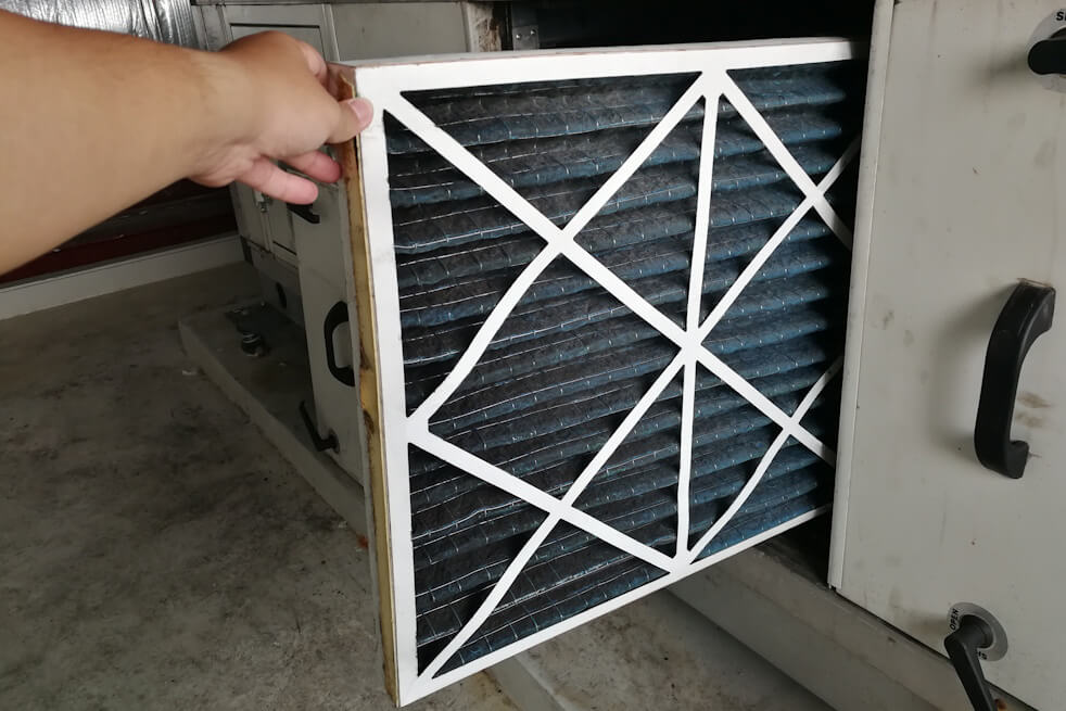 home owner changing air filter