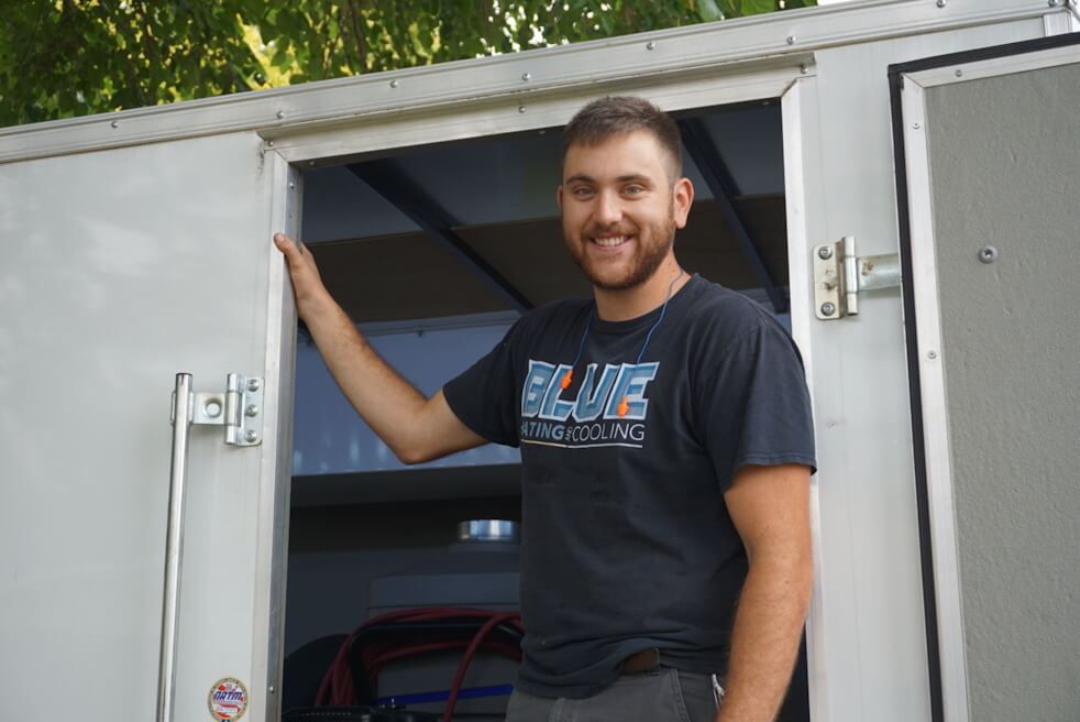 blue heating and cooling technician